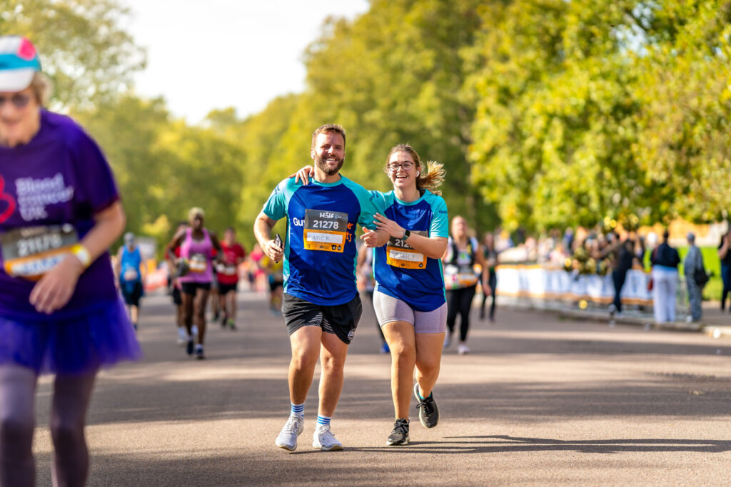 Two people running the Royal Parks Half Marathon
