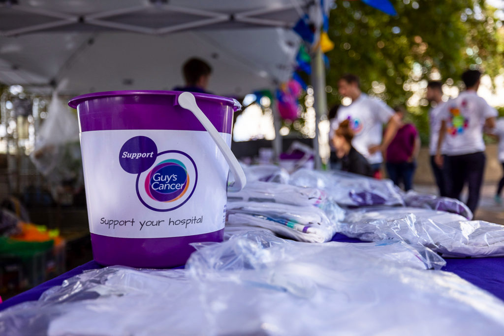 Fundraising bucket on table at event