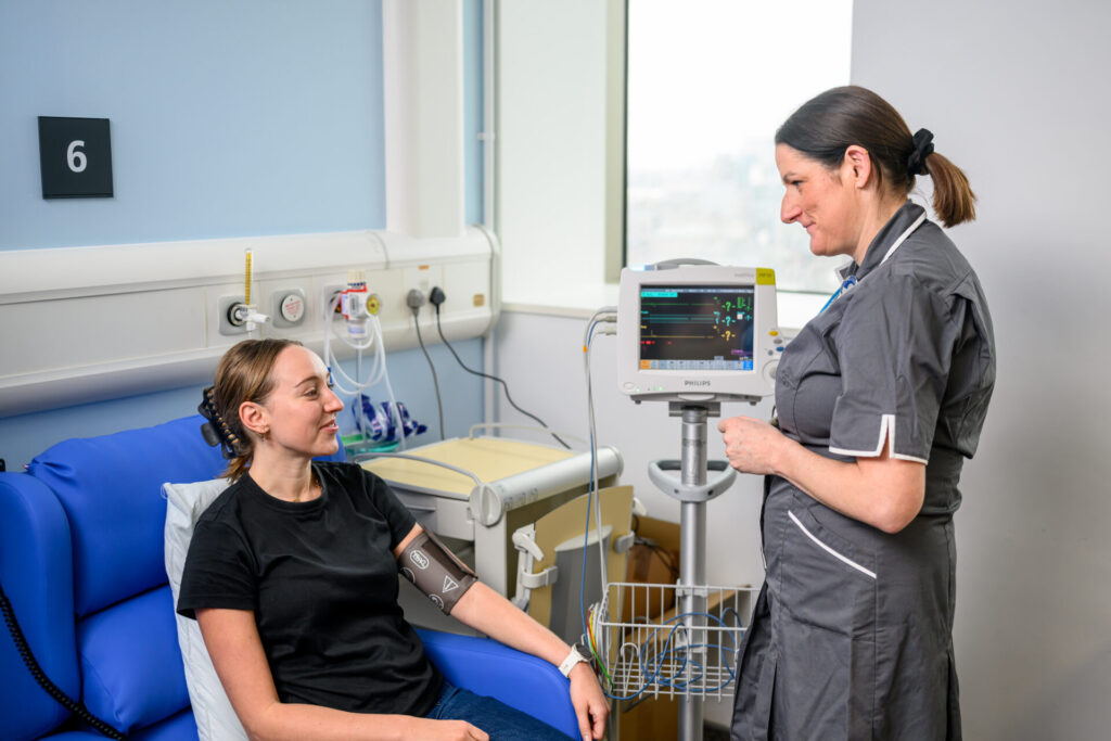 Patient with nurse in Guy