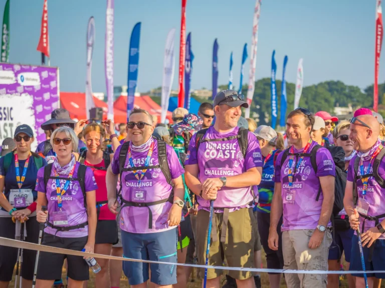 A group of people about to start the Jurassic Coast Ultra Challenge.