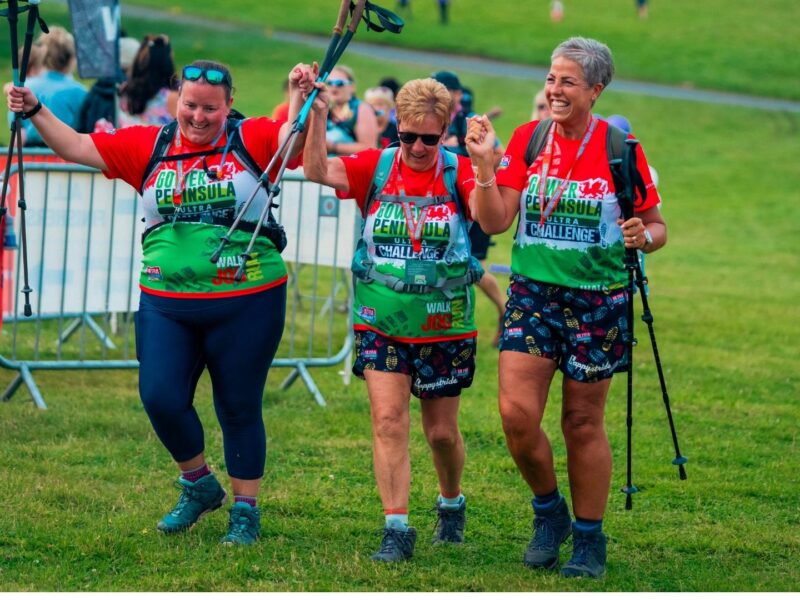Three Ultra Challengers taking part in the event, they appear to be happy with walking sticks in their hands.
